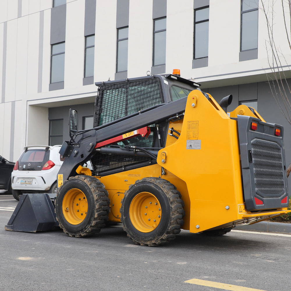 Cargadora compacta de dirección deslizante